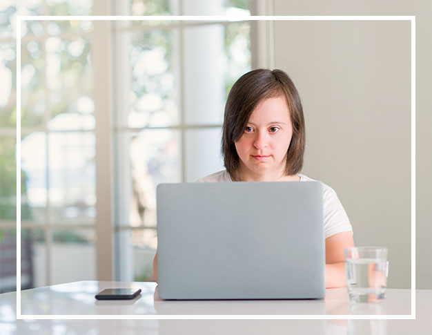 Photo of a Weston Bridges resident using a computer