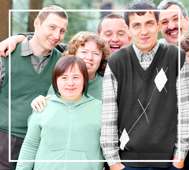 A photo of residents grouped together smiling for the camera